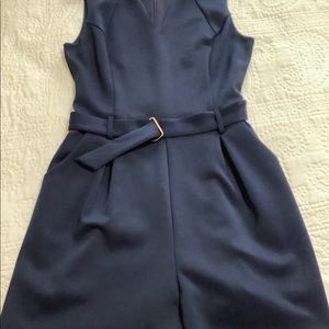 Navy blue romper with belt. NWOT